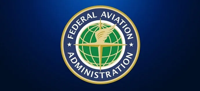 FAA Part 107 certificate and drone liability insurance paperwork on a desk