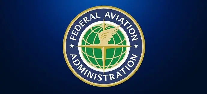 FAA Part 107 certificate and drone liability insurance paperwork on a desk
