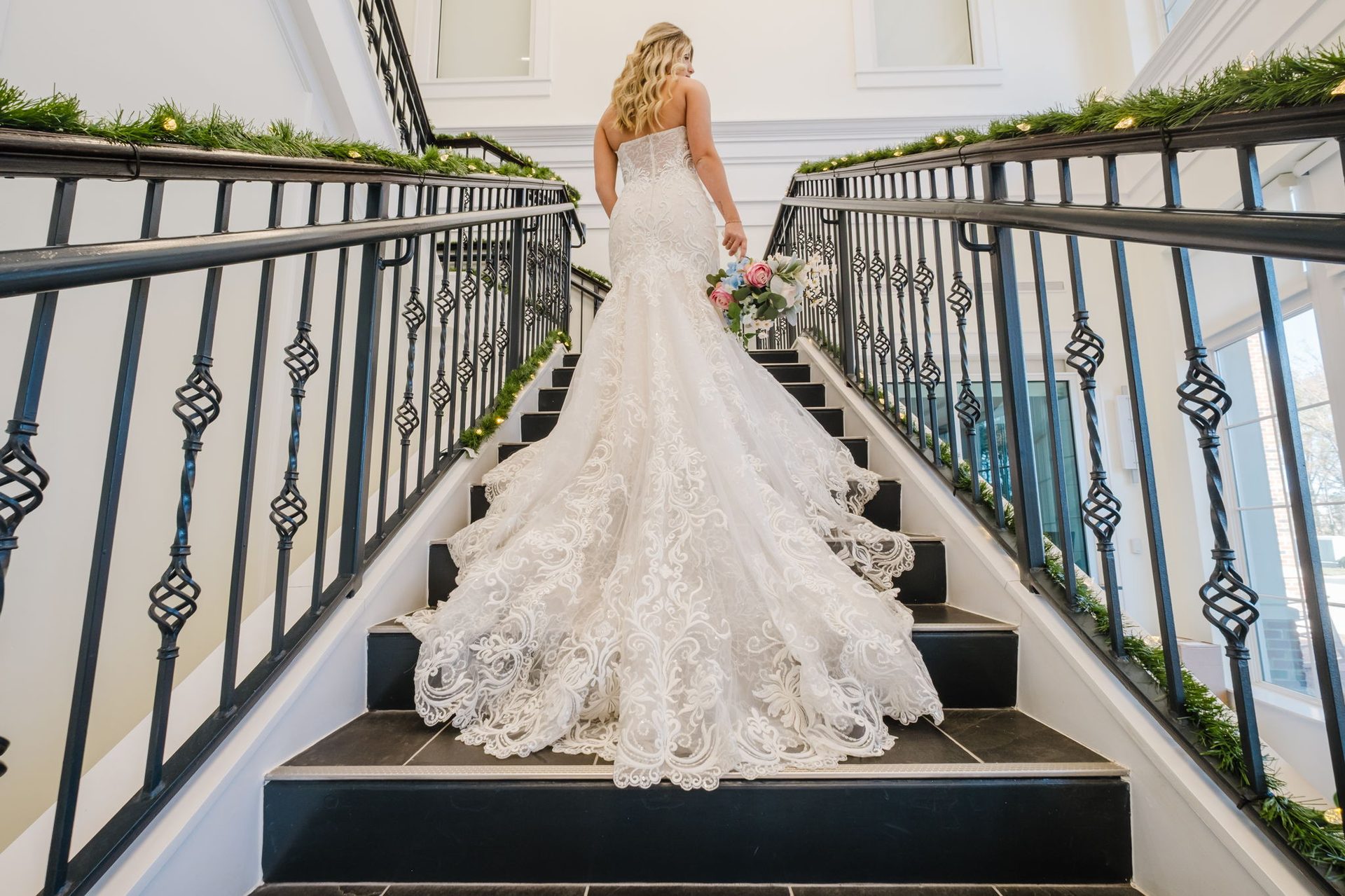 FPV drone flying through an empty Charlotte wedding venue set with a model bride