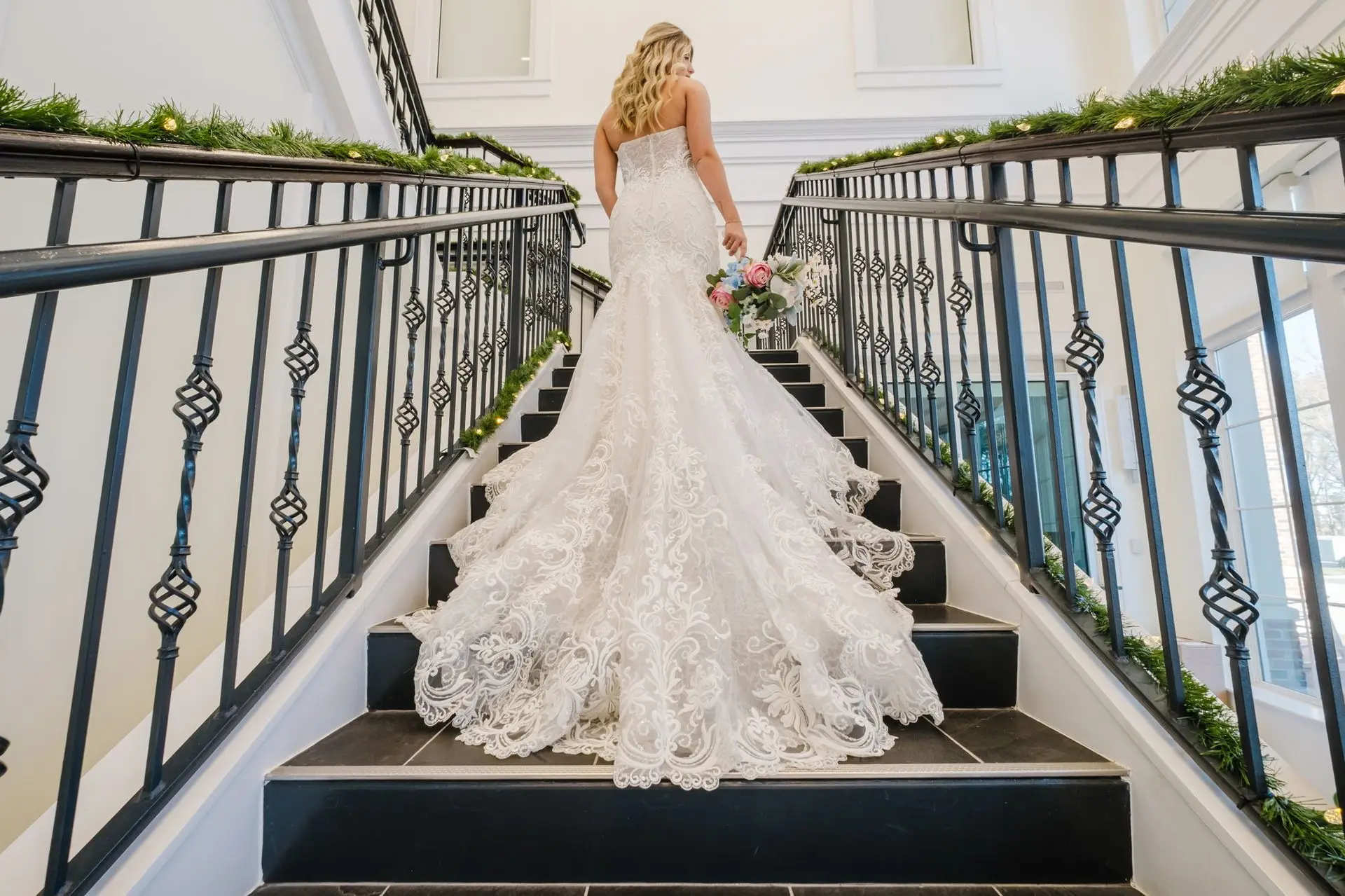 FPV drone flying through an empty Charlotte wedding venue set with a model bride